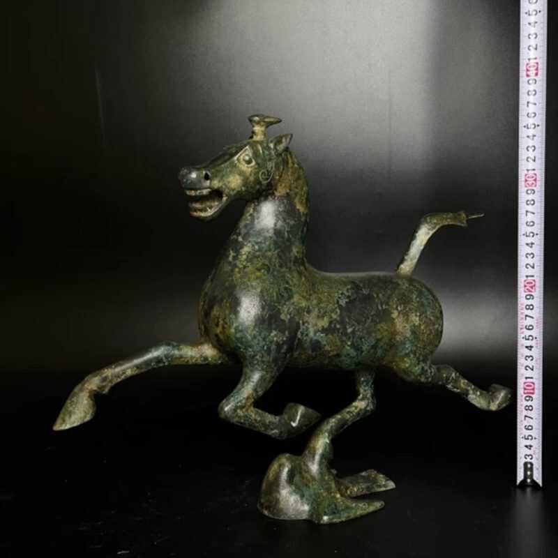 Horse steps on flying swallow, copper galloping horse