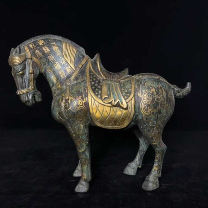 Antique bronze horse with gold inlay
